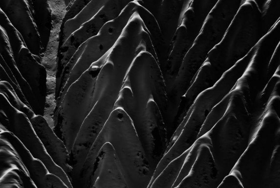 Что или кого спелеологи обычно называют шкуродером?