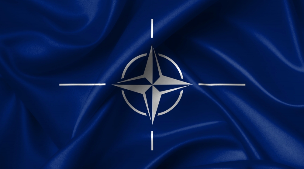 Какой язык не является официальным в НАТО: