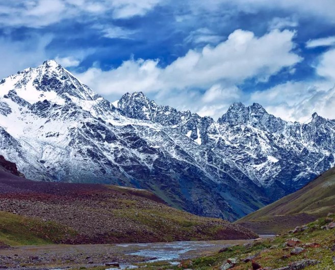 Высшей точкой какой горной системы является гора Торре-де-Серредо?