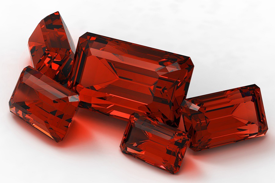 Одни из самых красивых драгоценных камней - рубин и сапфир - состоят из бесцветного оксида алюминия (Al2O3). Как объяснить яркую окраску этих минералов?